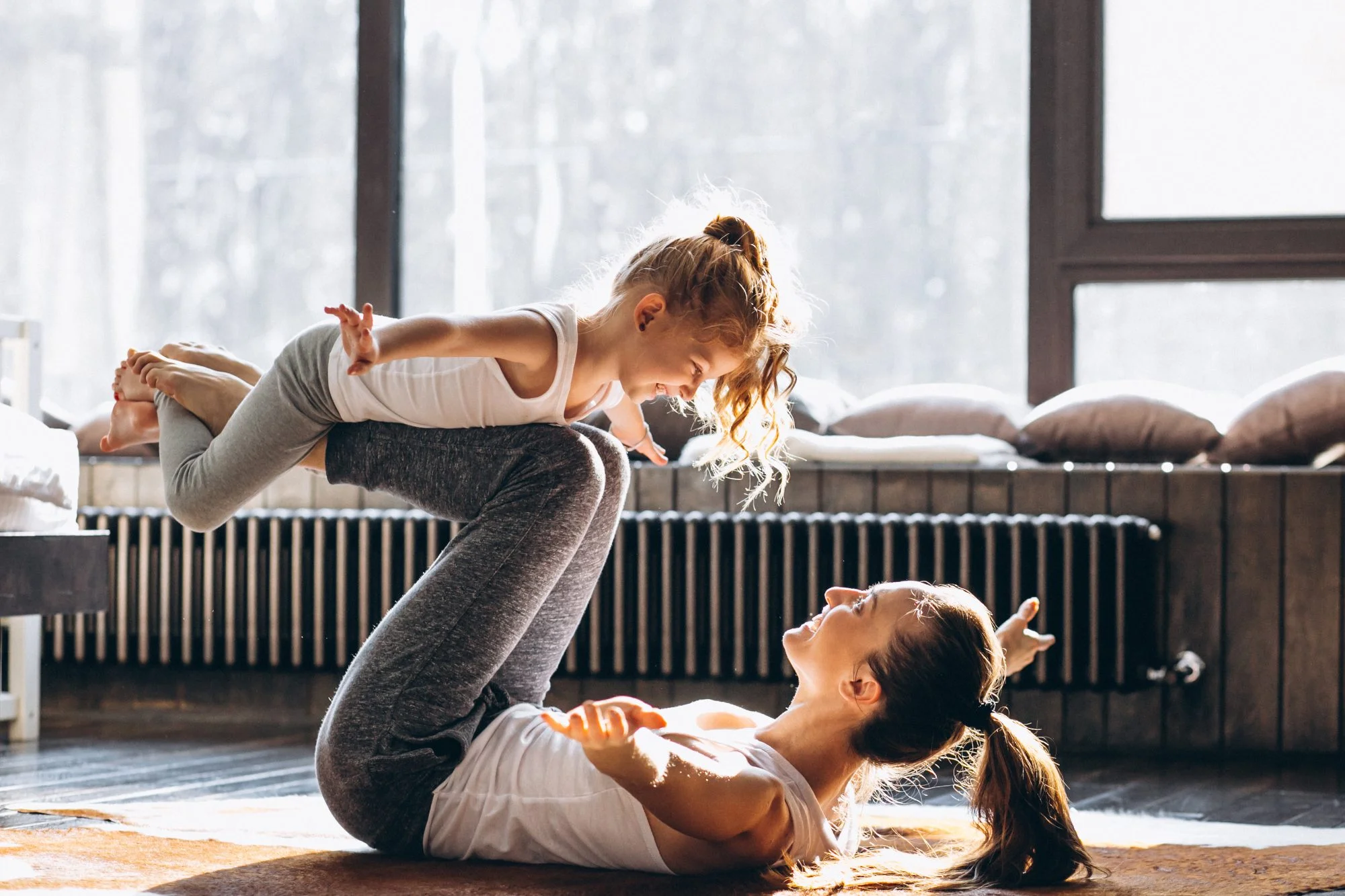 A parent and child together at home